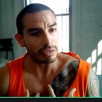 Daniel Salcedo interviene por videoconferencia con una camiseta naranja.