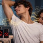 Imagen ilustrativa de una mujer junto a un hombre que levanta un brazo, acompañada de símbolos de productos de higiene.